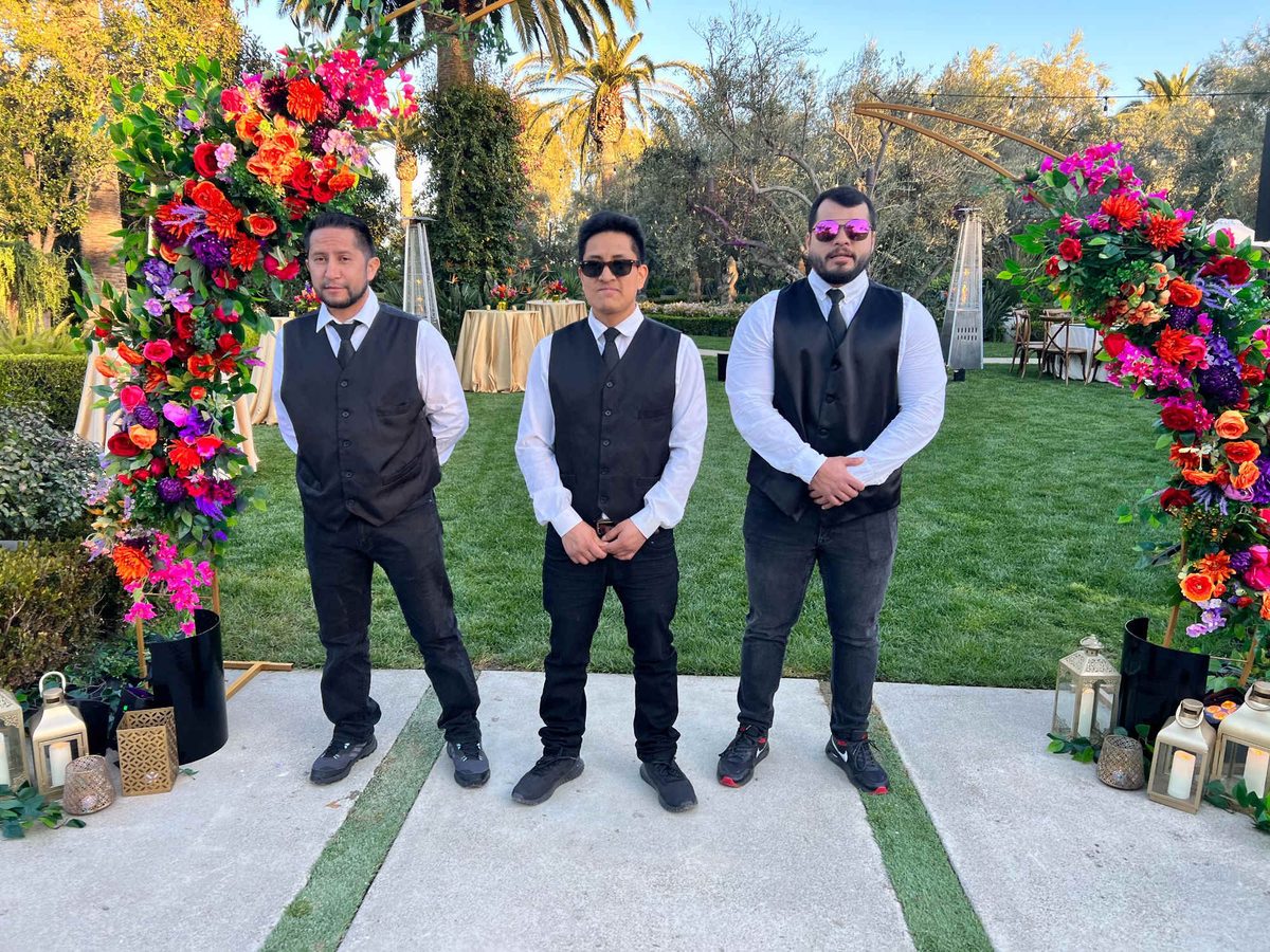 A&A team at floral garden wedding